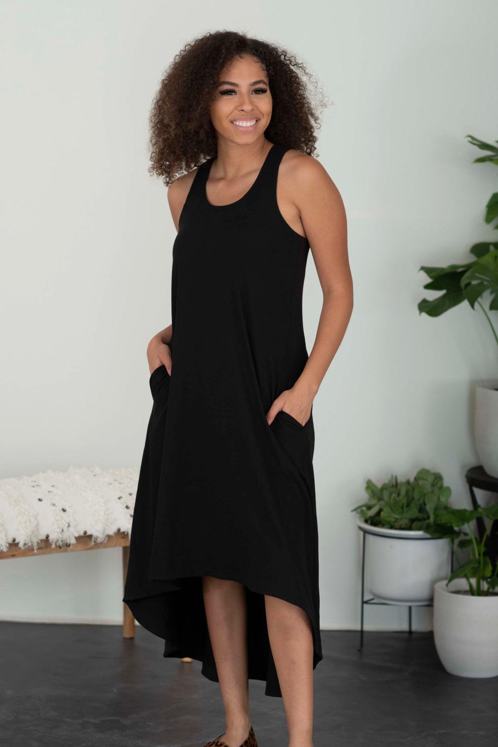 http://bluezoneplanet.com/cdn/shop/collections/Rae-Mode-Happy-Song-Full-Size-High-Low-Sleeveless-Dress-TOPS-DRESSES-8_8b8e921d-b73c-4f79-bf75-19ed11a71839.jpg?v=1659382453