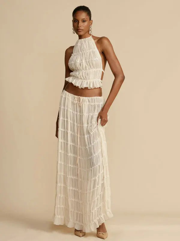 Blue Zone Planet | Ava's Backless Lace-Up Halter Top and Chiffon Pleated Maxi Skirt Two-Piece Set BLUE ZONE PLANET
