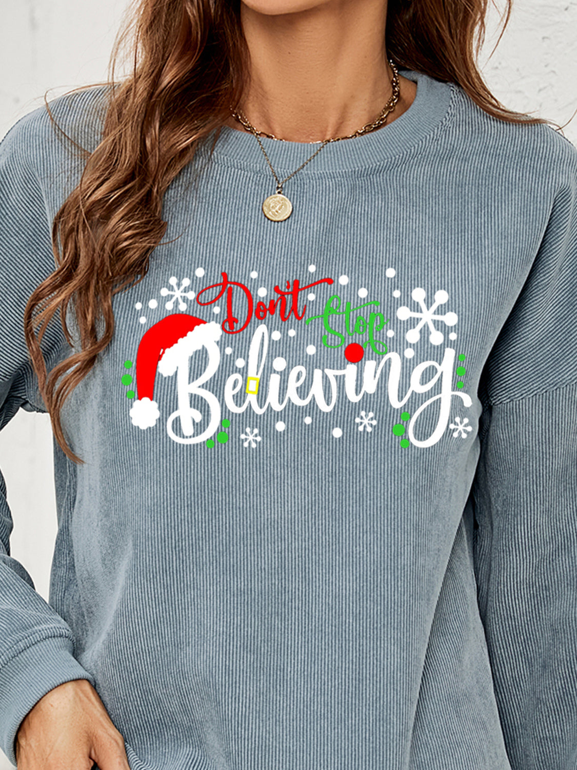 DON'T STOP BELIEVING Graphic Sweatshirt BLUE ZONE PLANET