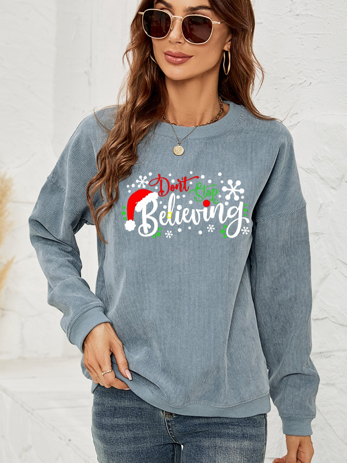 DON'T STOP BELIEVING Graphic Sweatshirt BLUE ZONE PLANET