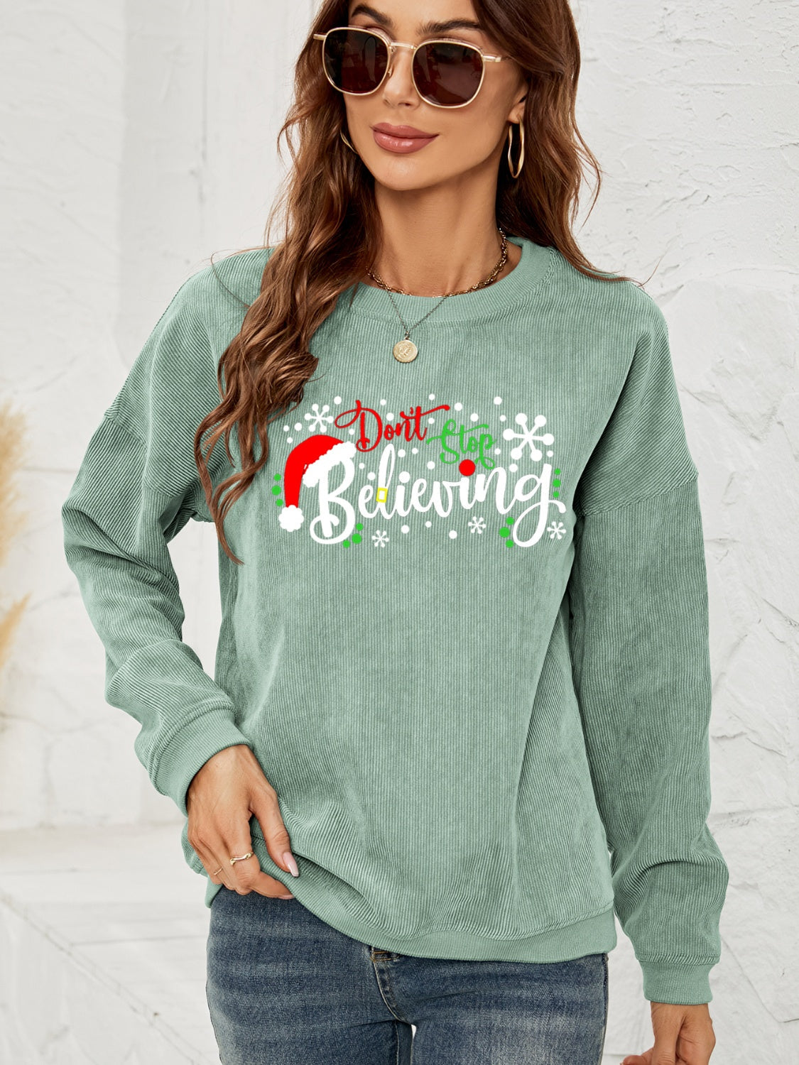 DON'T STOP BELIEVING Graphic Sweatshirt BLUE ZONE PLANET