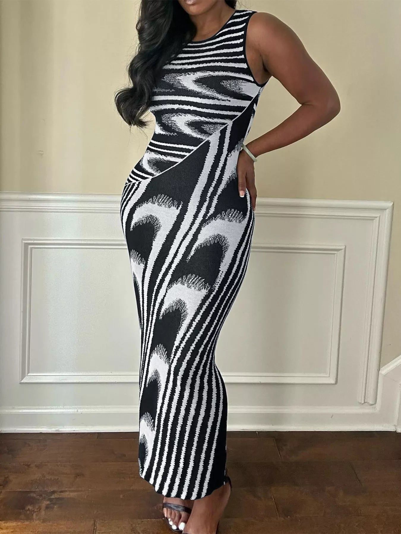 Plus Size Sleeveless Bodycon Maxi Dress With Abstract Print Black / 1XL by Blue Zone Planet Plus Size Sleeveless Bodycon Maxi Dress With Abstract Print Black / 1XL by Blue Zone Planet