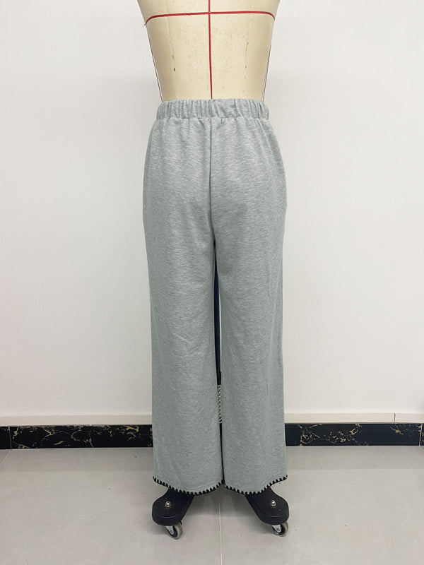 Belted casual straight-leg pants with contrasting trim and elastic waist