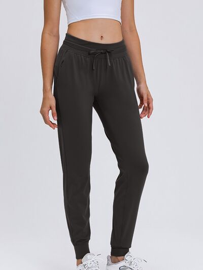Double Take Tied Joggers with Pockets BLUE ZONE PLANET