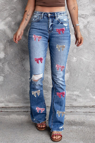 Sequin Bow Distressed Bootcut Jeans Trendsi