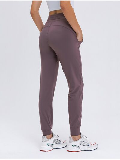 Double Take Tied Joggers with Pockets BLUE ZONE PLANET