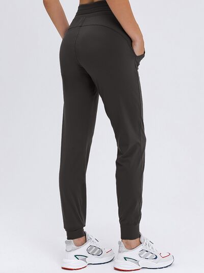 Double Take Tied Joggers with Pockets BLUE ZONE PLANET
