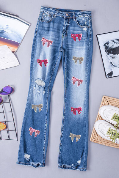 Sequin Bow Distressed Bootcut Jeans Trendsi