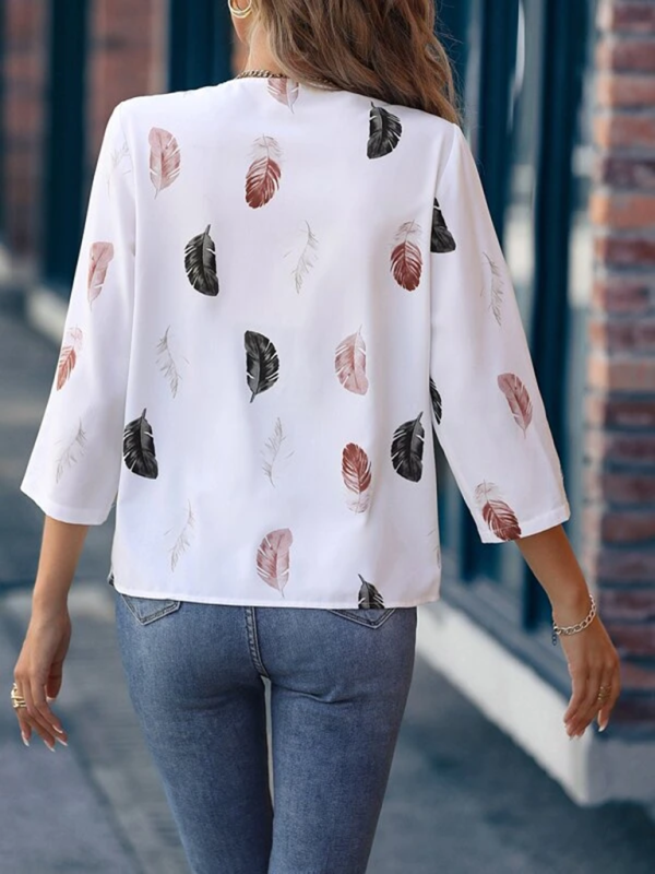 Blue Zone Planet | V-Neck Feather Print Cropped Sleeve Loose Blouse kakaclo