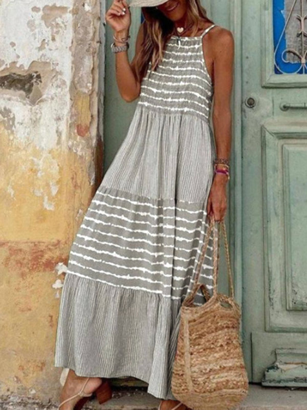 Elegant spaghetti straps, round neck and large swing stitching dress kakaclo