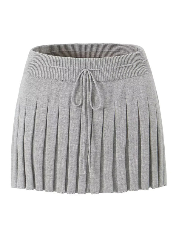 Lapel Long-sleeved Jacket + Color Matching Spaghetti Straps + Pleated Skirt kakaclo