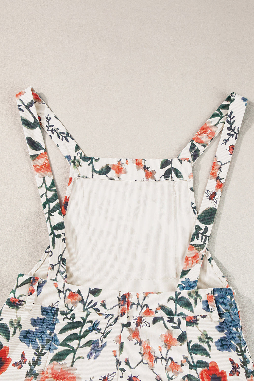 Beige Floral Print Bib Open Back Romper Blue Zone Planet