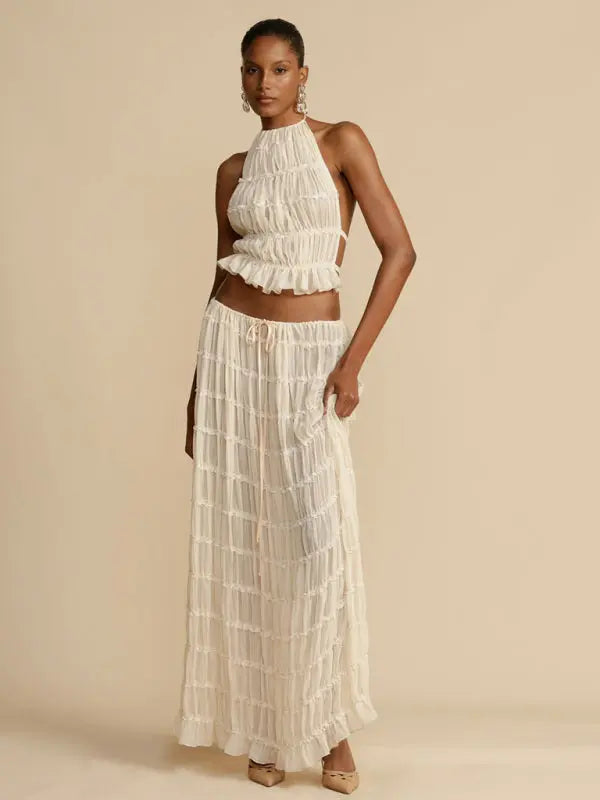 Blue Zone Planet |  Ava's Backless Lace-Up Halter Top and Chiffon Pleated Maxi Skirt Two-Piece Set BLUE ZONE PLANET