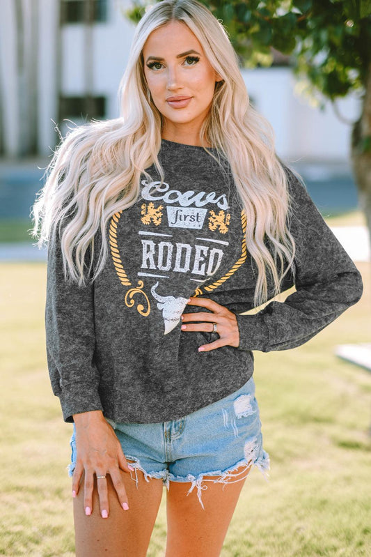 Mineral Washed COW'S FIRST RODEO Round Neck Raglan Sleeve Sweatshirt BLUE ZONE PLANET