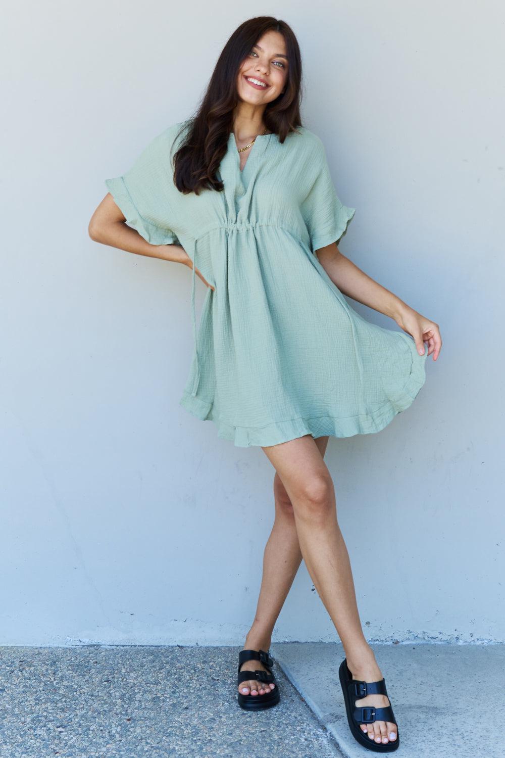 Ninexis Out Of Time Full Size Ruffle Hem Dress with Drawstring Waistband in Light Sage BLUE ZONE PLANET