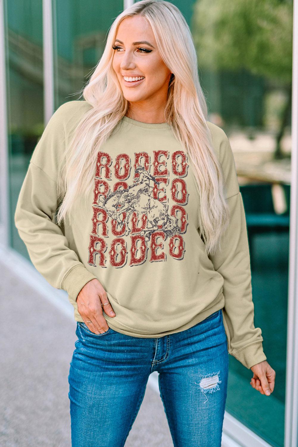 Round Neck Dropped Shoulder RODEO Graphic Sweatshirt BLUE ZONE PLANET