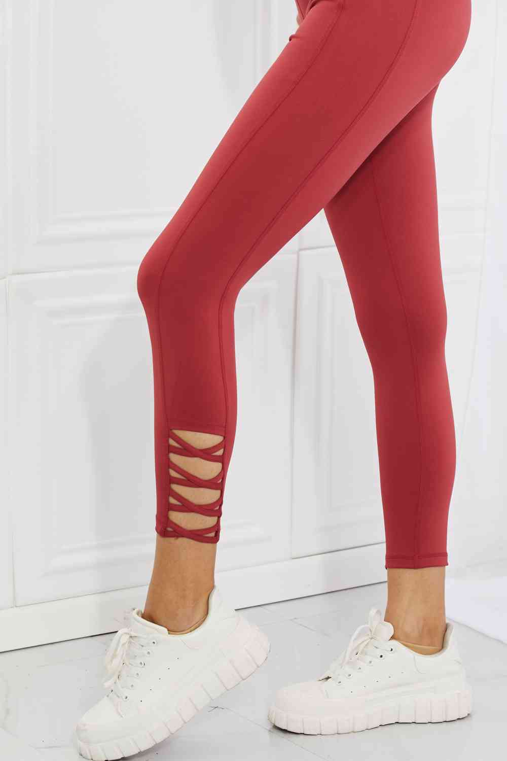 Yelete Ready For Action Full Size Ankle Cutout Active Leggings in Brick Red BLUE ZONE PLANET