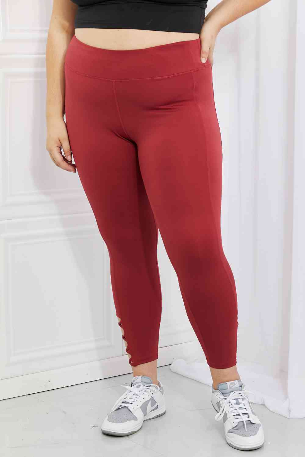 Yelete Ready For Action Full Size Ankle Cutout Active Leggings in Brick Red BLUE ZONE PLANET