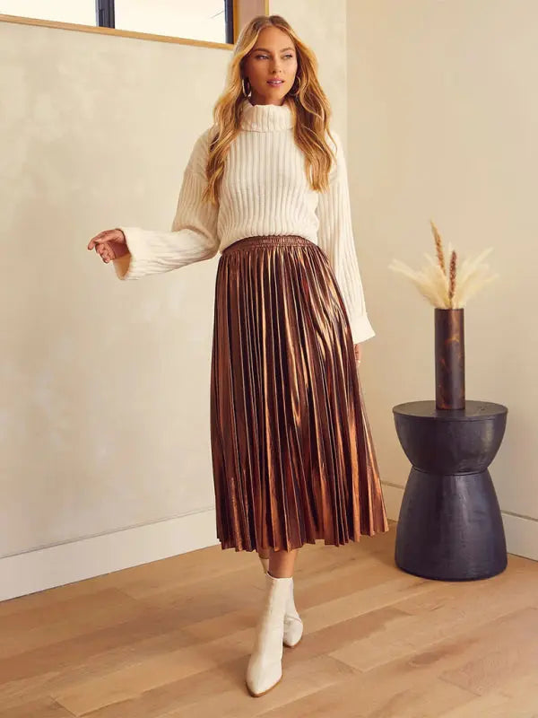 Zara's shiny pleated high-waisted A-line midi skirt kakaclo