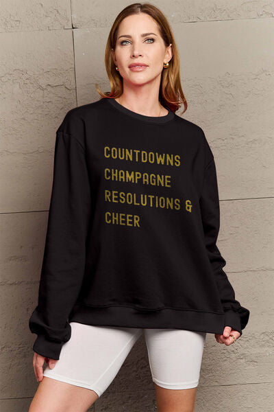 Blue Zone Planet |  Simply Love Full Size COUNTDOWNS CHAMPAGNE RESOLUTIONS & CHEER Round Neck Sweatshirt BLUE ZONE PLANET