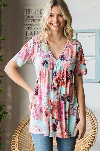 Heimish Full Size Floral V-Neck Short Sleeve Babydoll Blouse BLUE ZONE PLANET