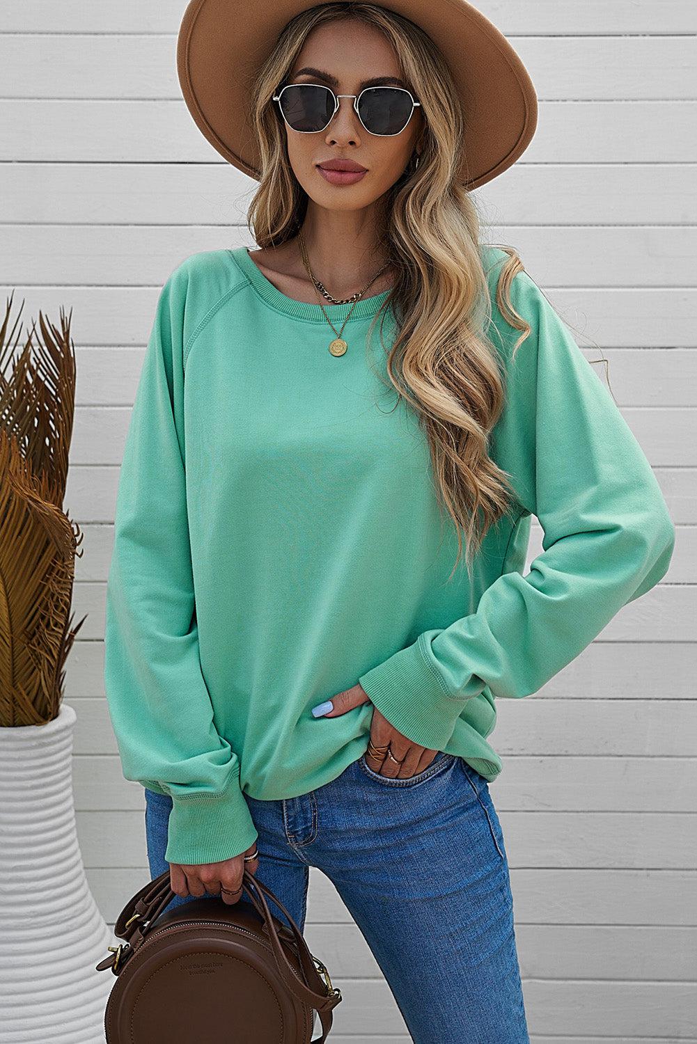 Round Neck Raglan Sleeve Exposed Seam Sweatshirt BLUE ZONE PLANET