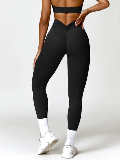 Ruched Pocketed High Waist Active Leggings Trendsi