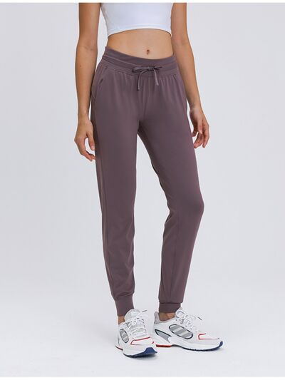 Double Take Tied Joggers with Pockets BLUE ZONE PLANET