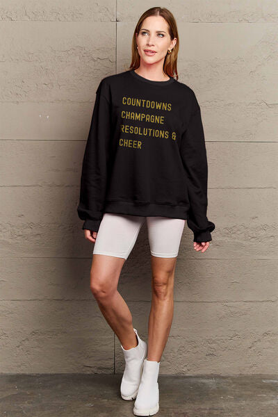 Blue Zone Planet |  Simply Love Full Size COUNTDOWNS CHAMPAGNE RESOLUTIONS & CHEER Round Neck Sweatshirt BLUE ZONE PLANET